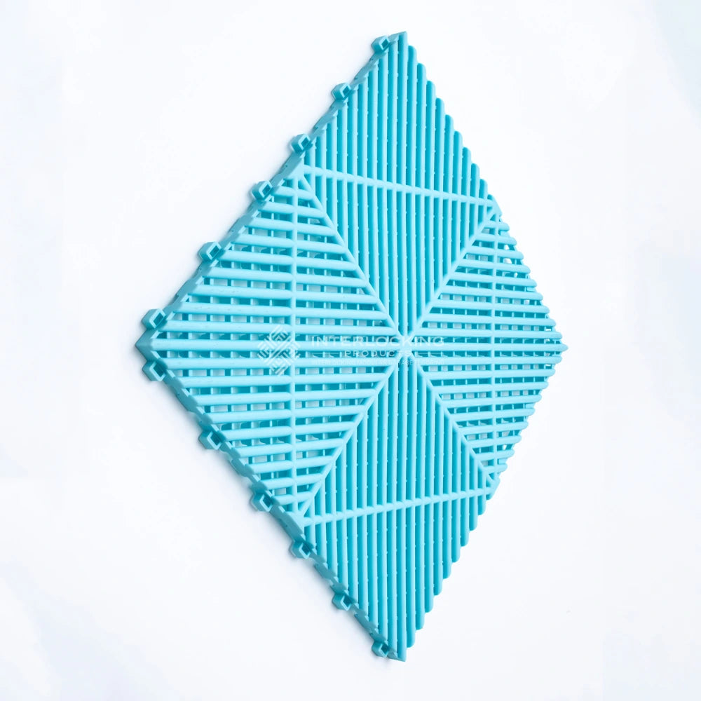 Blue plastic interlocking tile on a white background