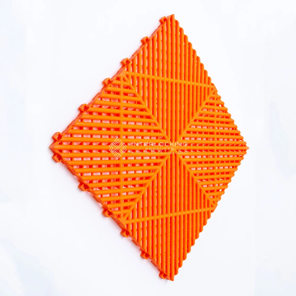 Orange geometric patterned object on a white background