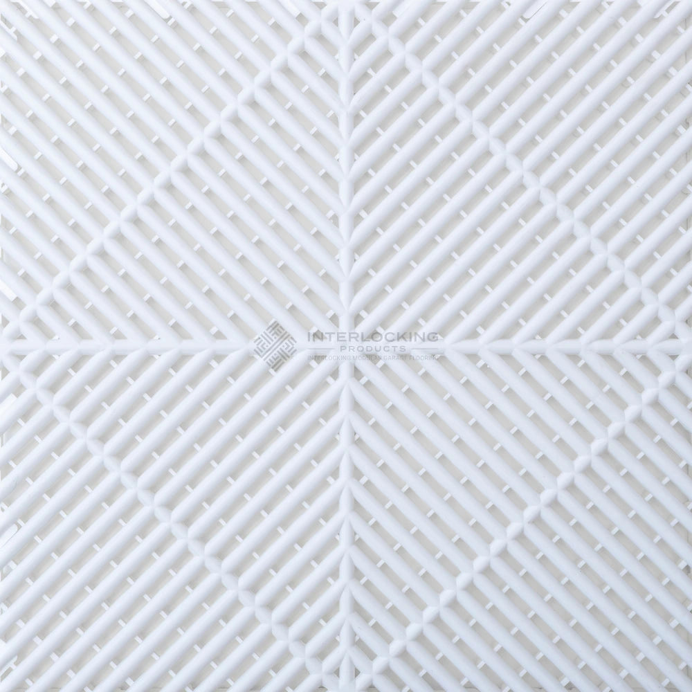 White textured tile with geometric pattern on a white background